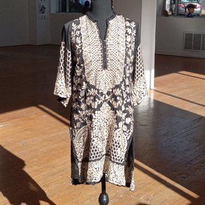 Long sleeve sheer black with creamy tan embroidered detailing over entir…